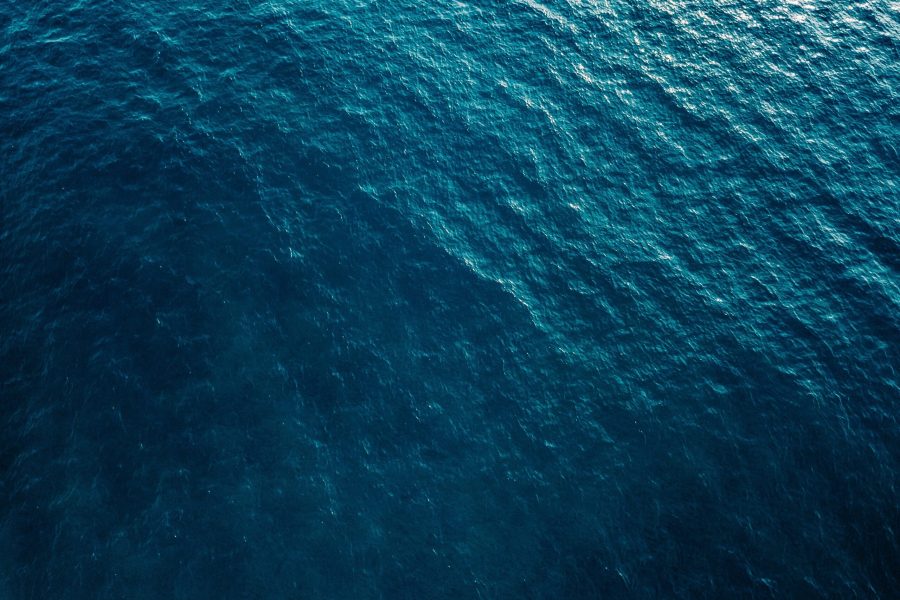 Aerial view of blue sea surface Aerial view of blue and turquoise sea surface