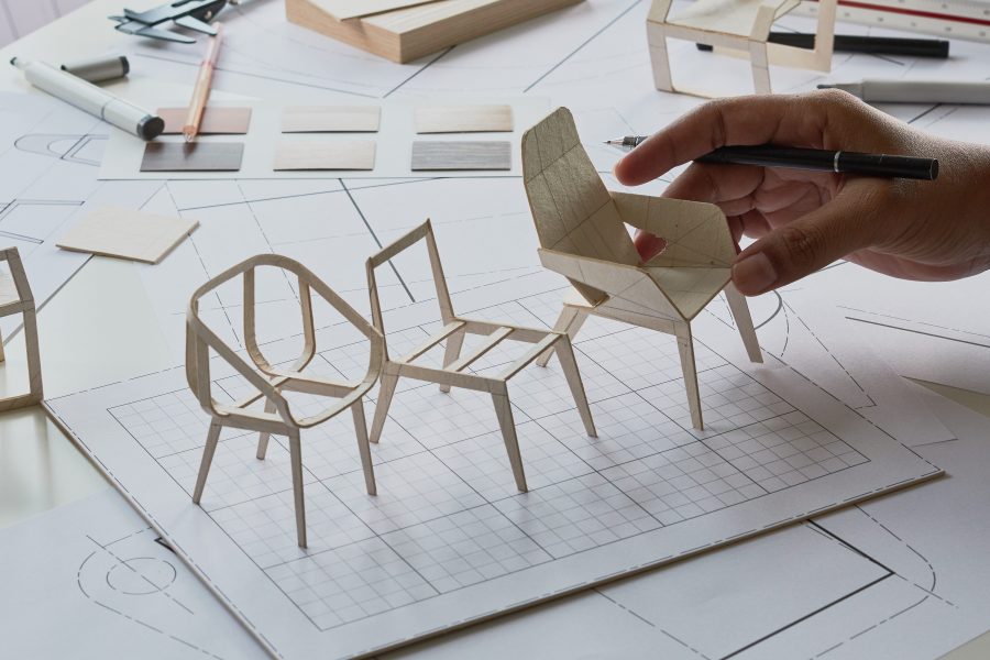 Designer sketching drawing design development product plan draft chair armchair Wingback Interior furniture prototype manufacturing production. designer studio concept .