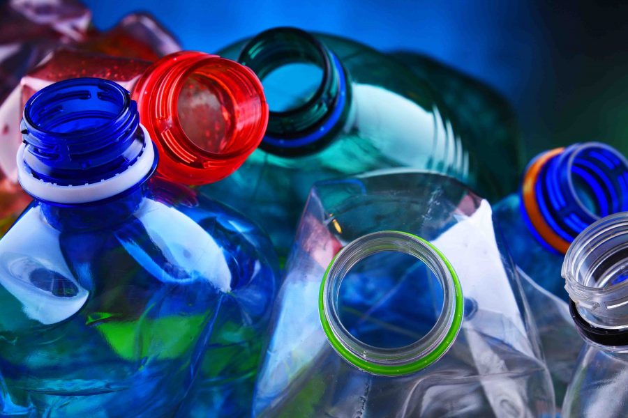 Empty colored carbonated drink bottles. Plastic waste